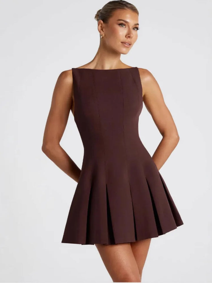 Backless Elegance – Spaghetti Strap Pleated Mini Dress