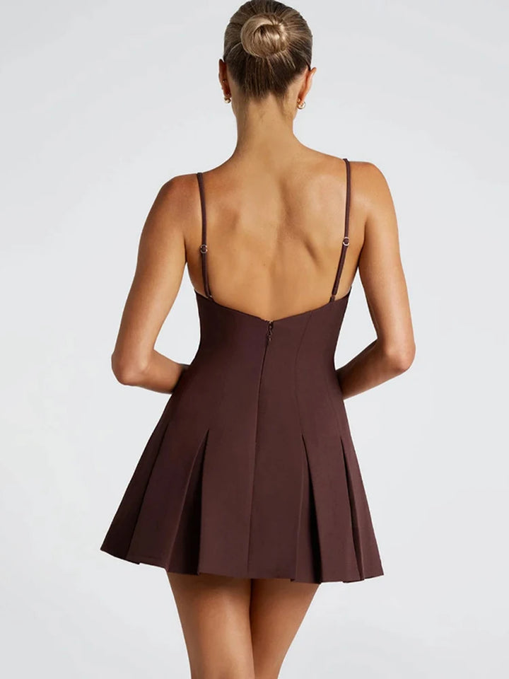 Backless Elegance – Spaghetti Strap Pleated Mini Dress